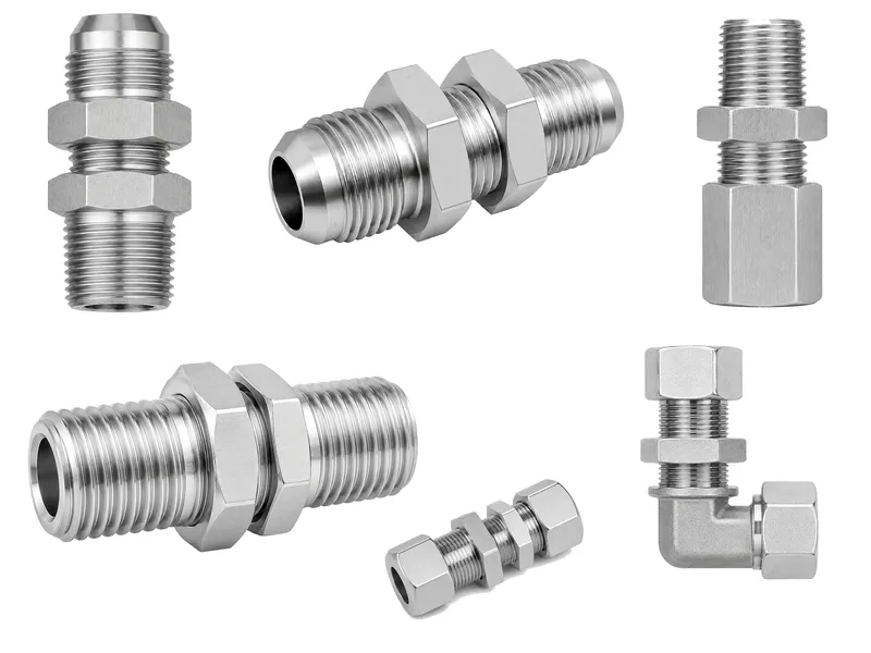 Group of straight and elbow bulkhead fittings with varied threaded and flared-looking ends